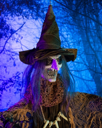 Voodoo Hexe mit schlitzenden Armen, Licht & Ton 110cm