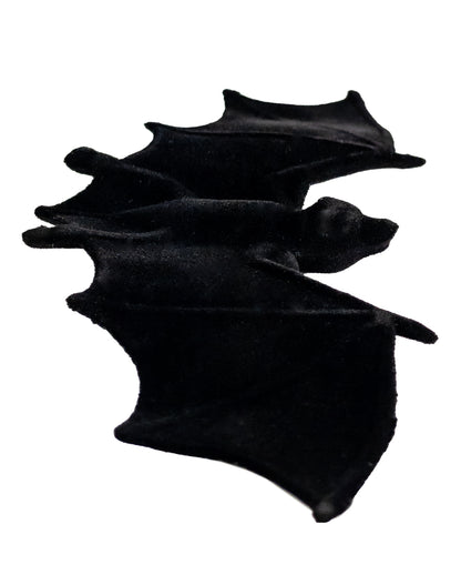 2 schwarze beflockte Fledermäuse