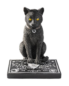 Schwarze Katze mit Hexenbrett