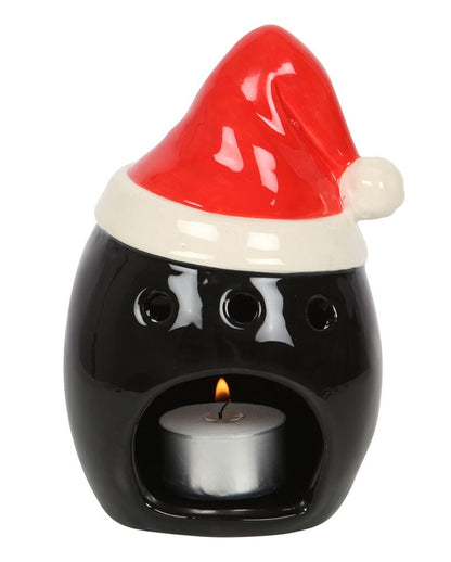 Schwarzer Totenschädel mit Weihnachtsmütze Teelichthalter