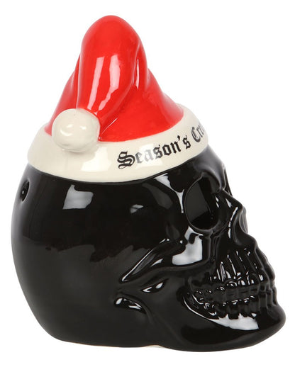 Schwarzer Totenschädel mit Weihnachtsmütze Teelichthalter